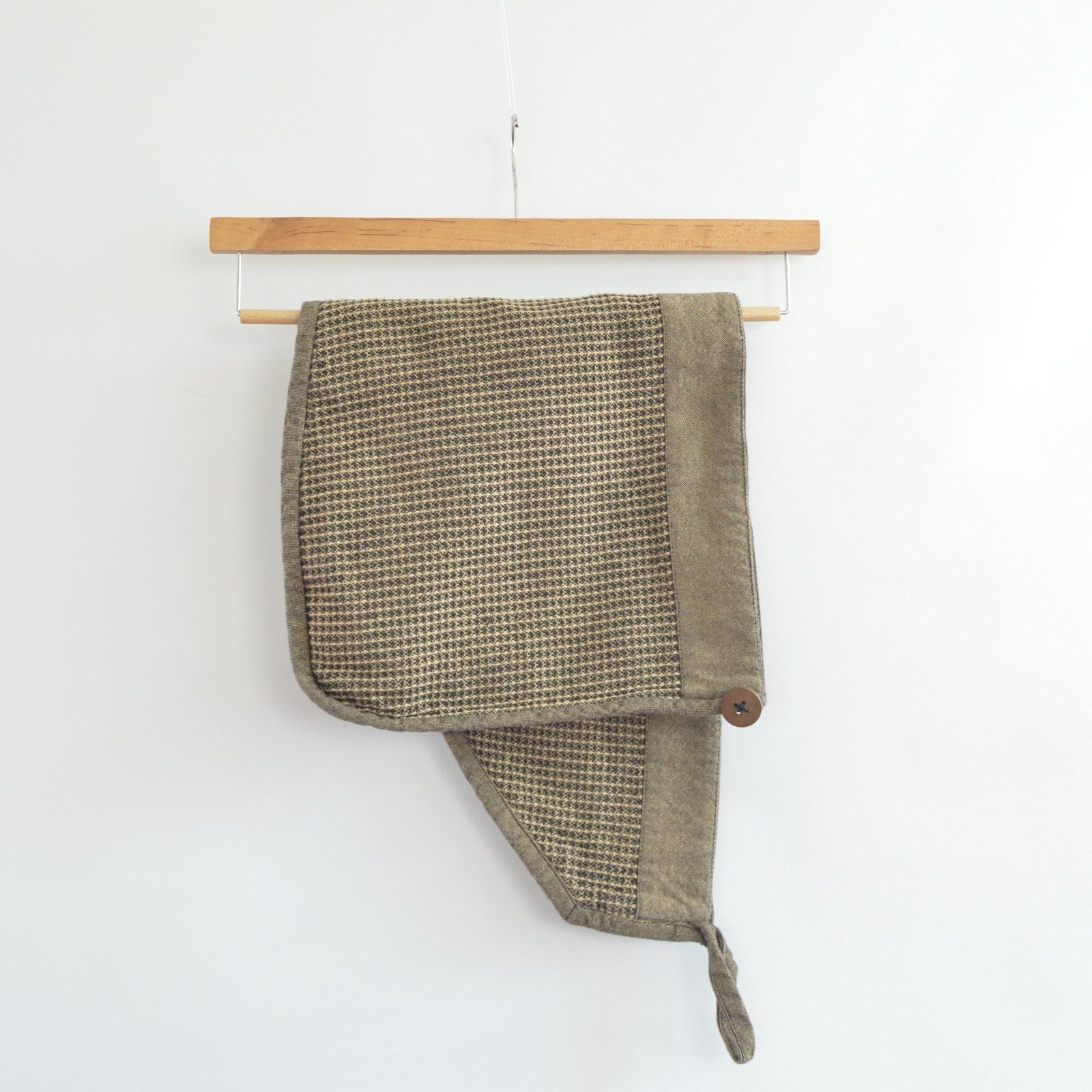 beige and black cotton hair towel