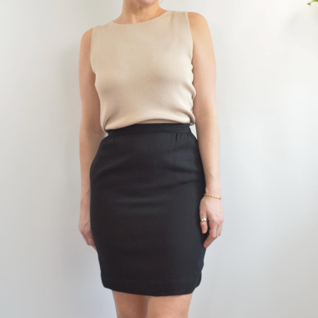 fully lined knee length black wool skirt with pockets