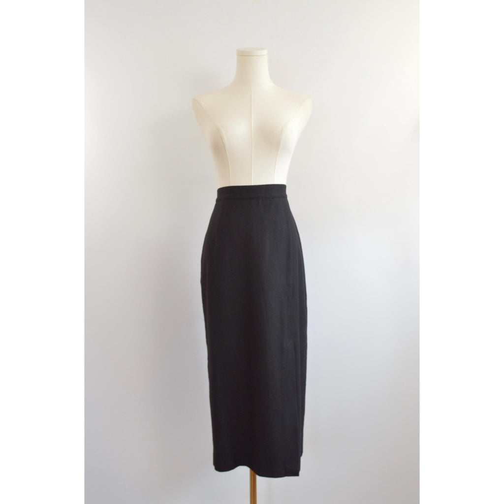 medium black wool midi skirt with off center front slit and full lining