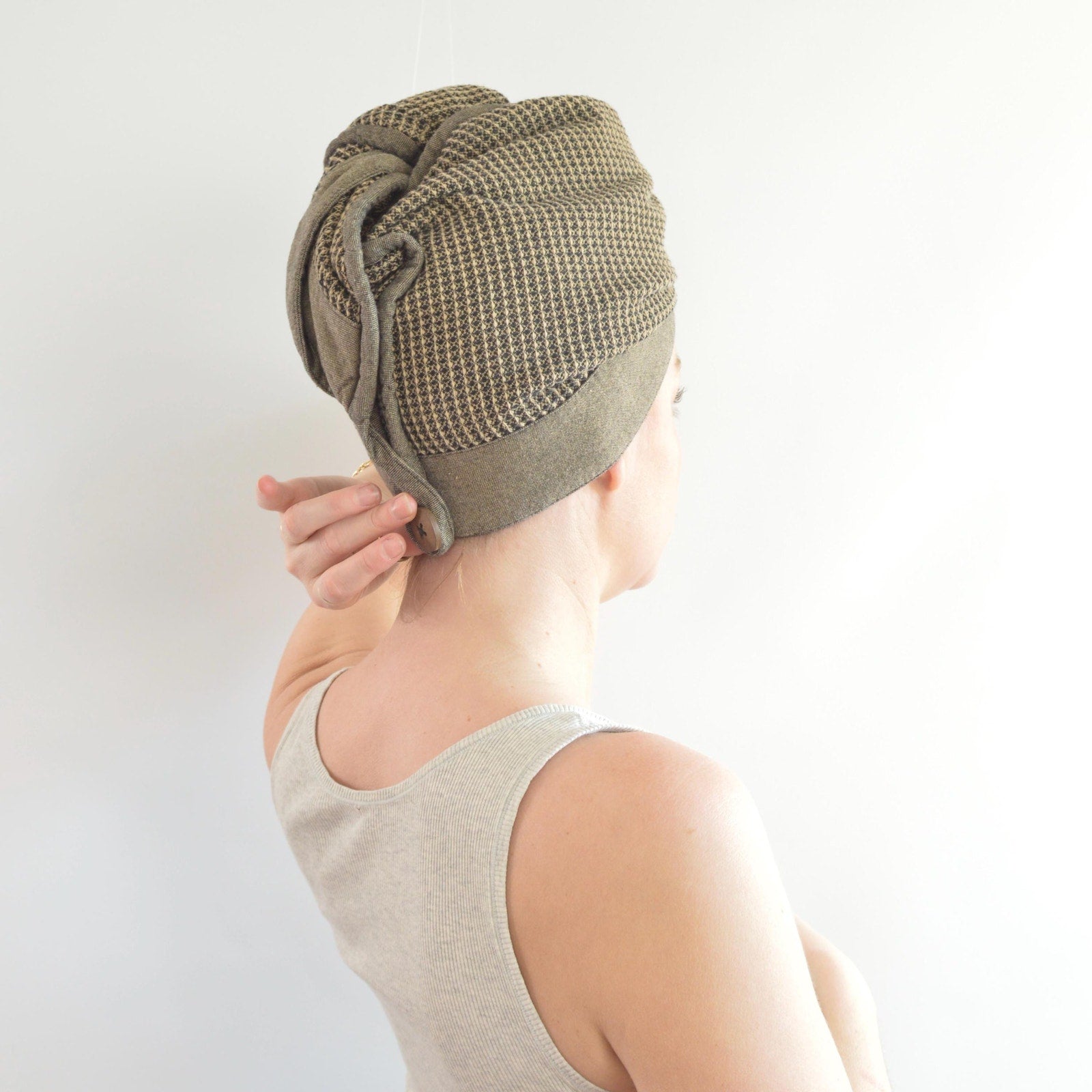 beige and black cotton hair towel