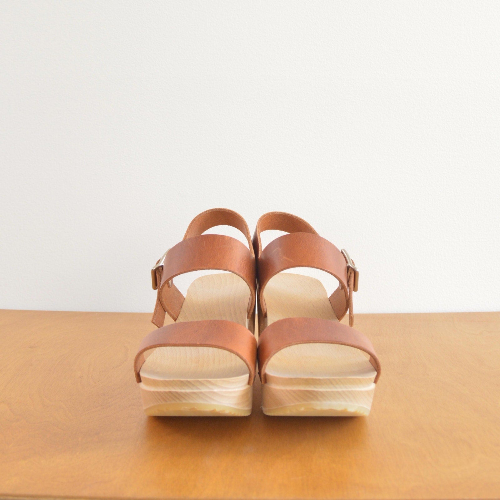 simple two strap wooden and leather clog heels