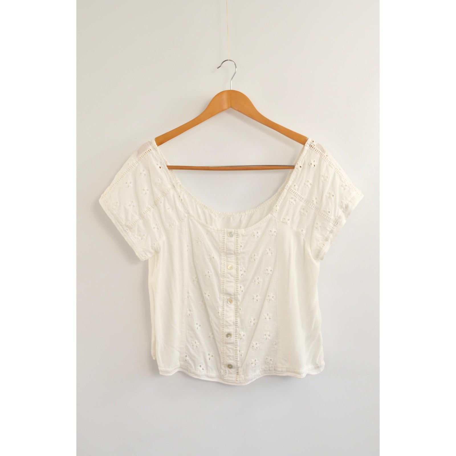 white vintage eyelet off the shoulder button down crop blouse