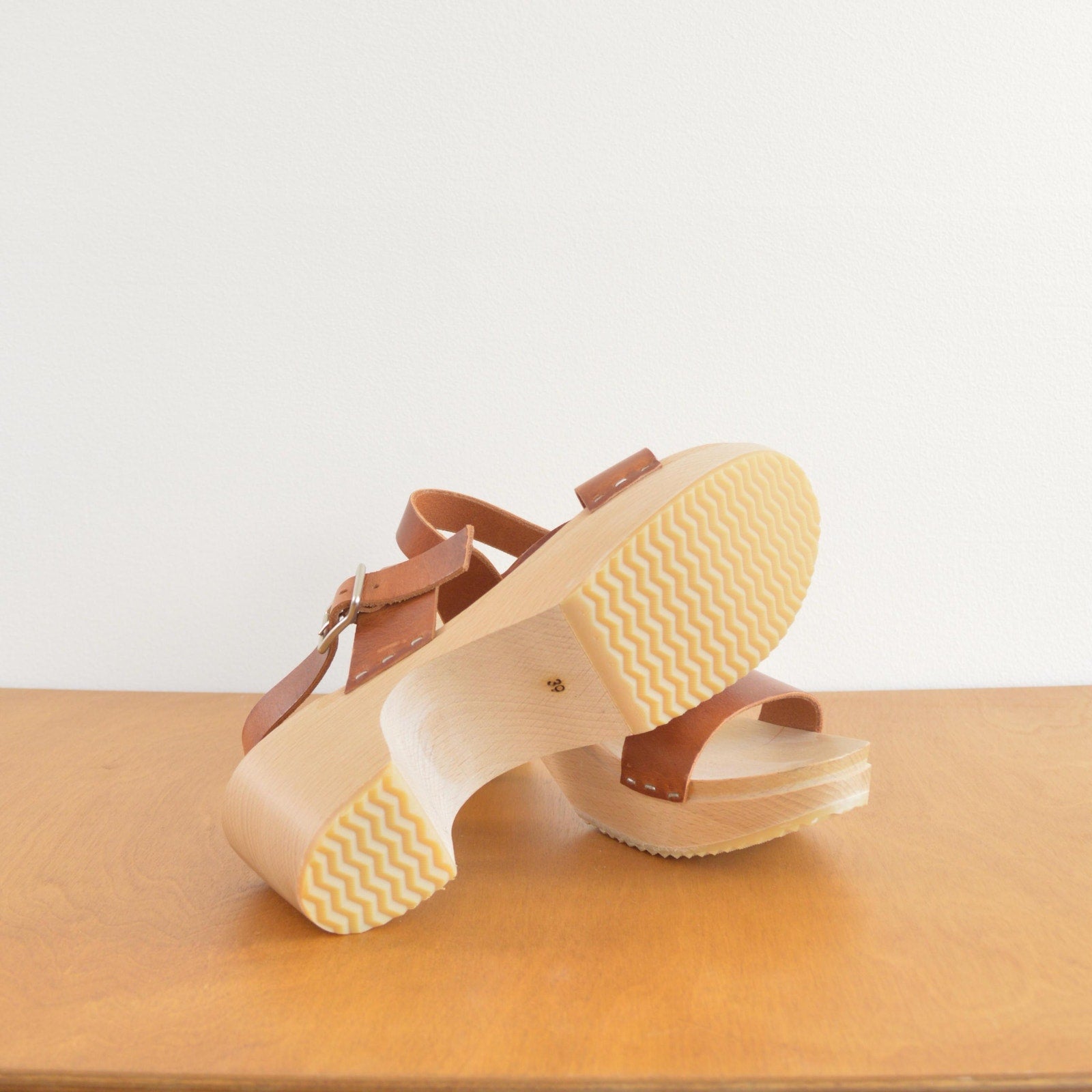 simple two strap wooden and leather clog heels