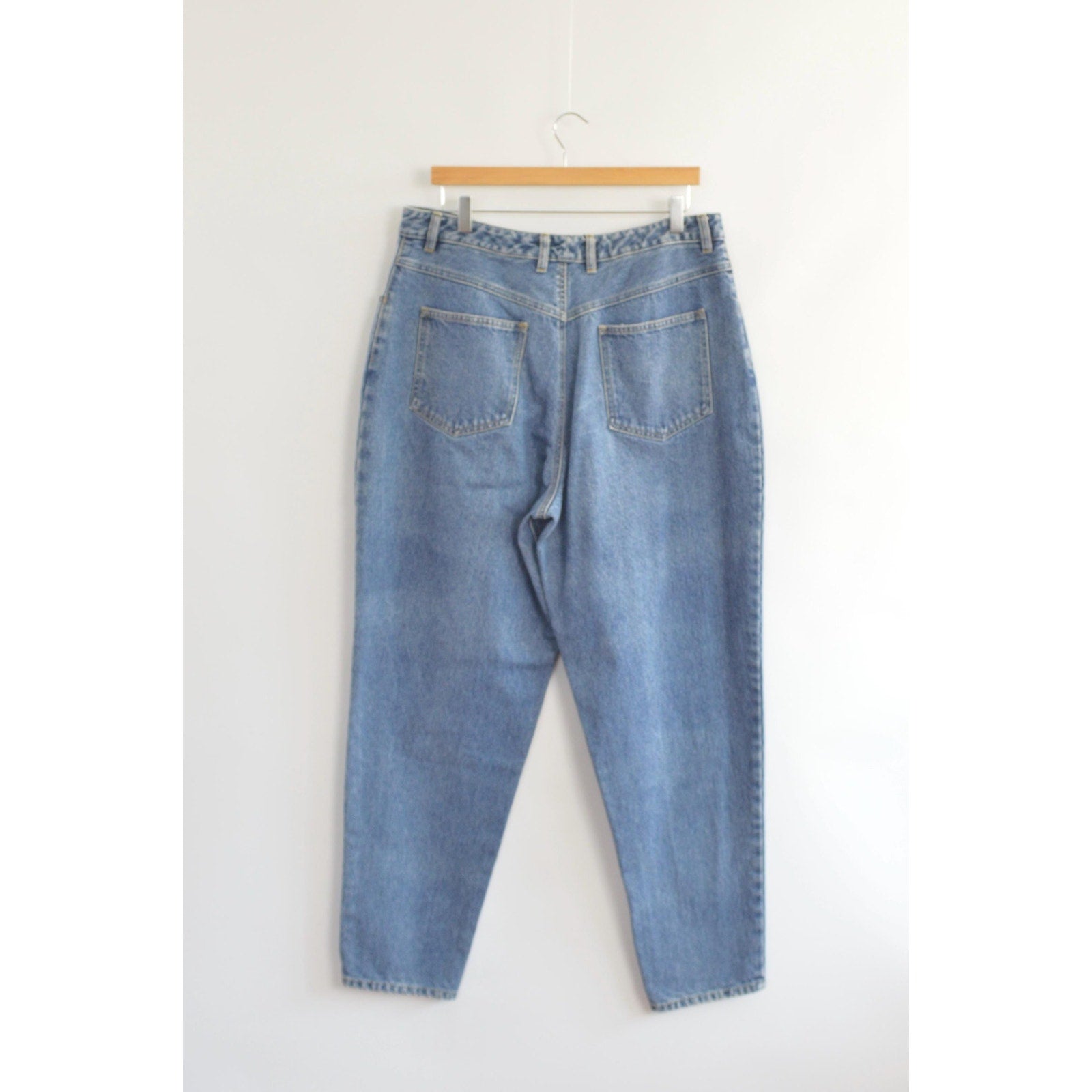 35 x 30 mid wash high rise tapered jeans