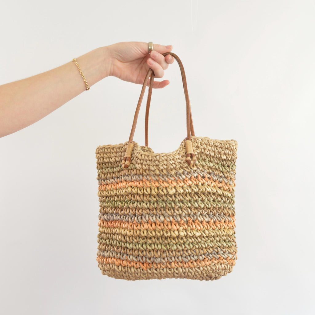 olive, blue and peach striped straw bag with leather handles