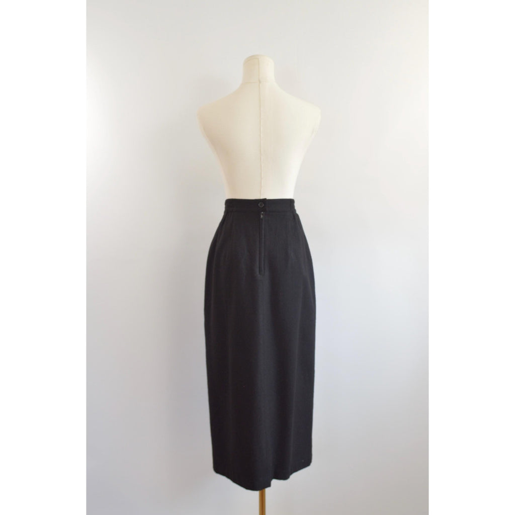 medium black wool midi skirt with off center front slit and full lining
