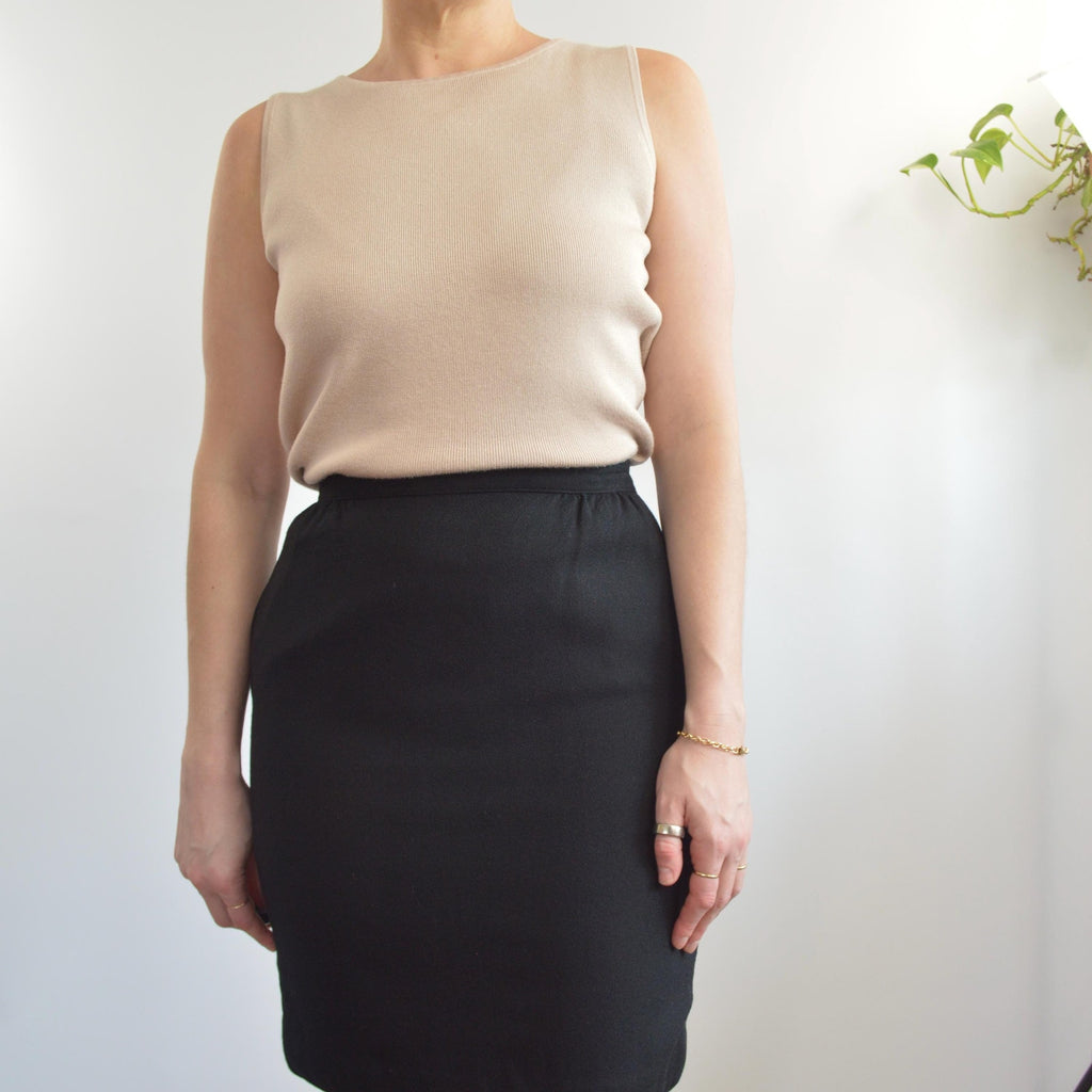 fully lined knee length black wool skirt with pockets