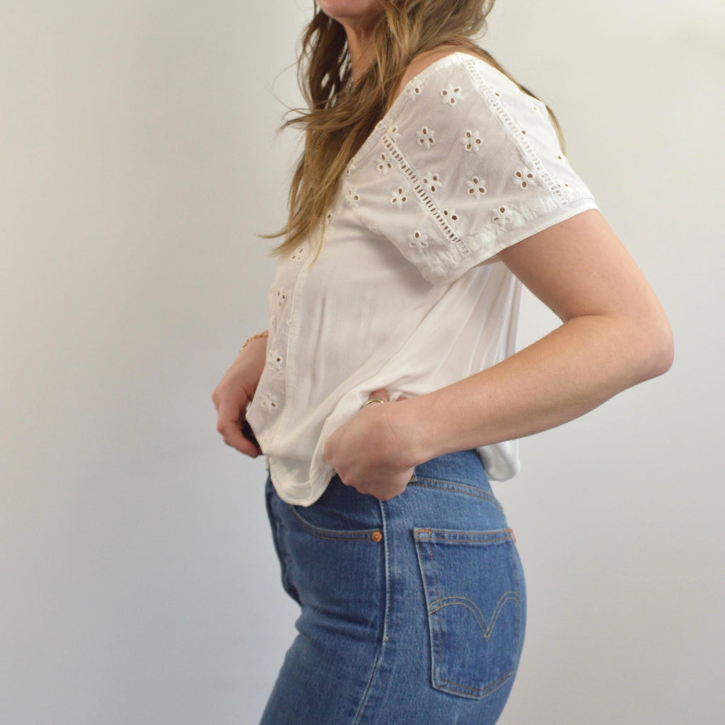 white vintage eyelet off the shoulder button down crop blouse