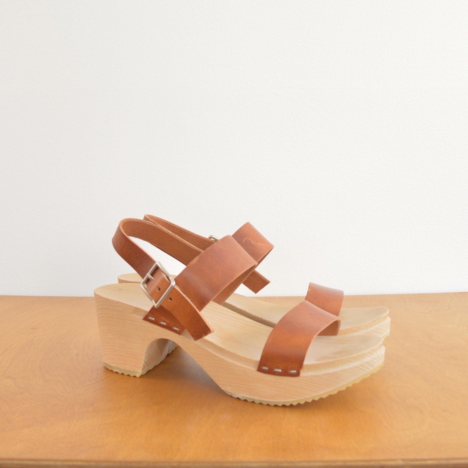 simple two strap wooden and leather clog heels