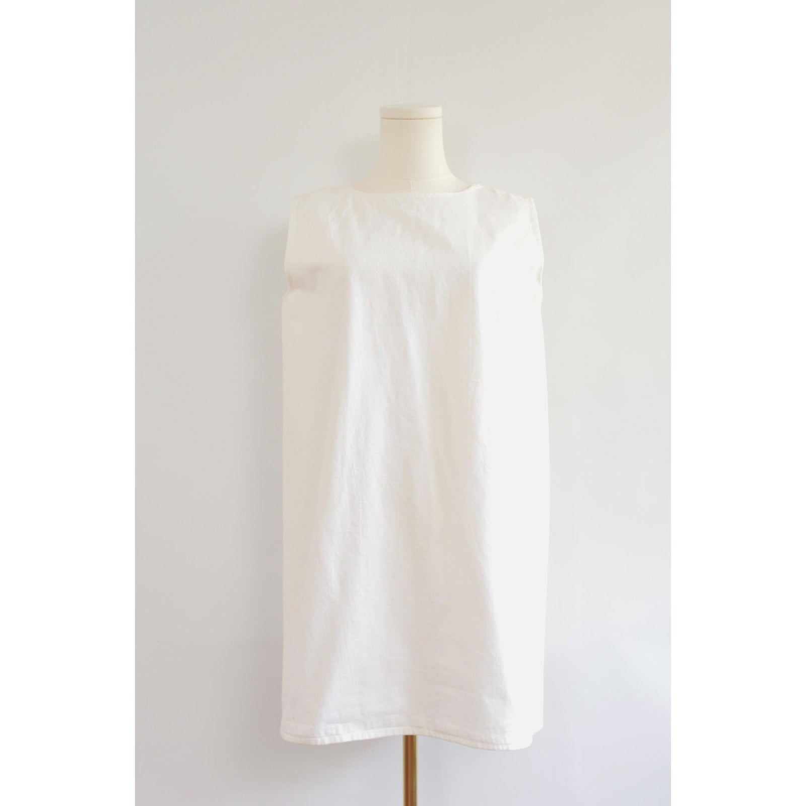 thick structured white denim mini dress