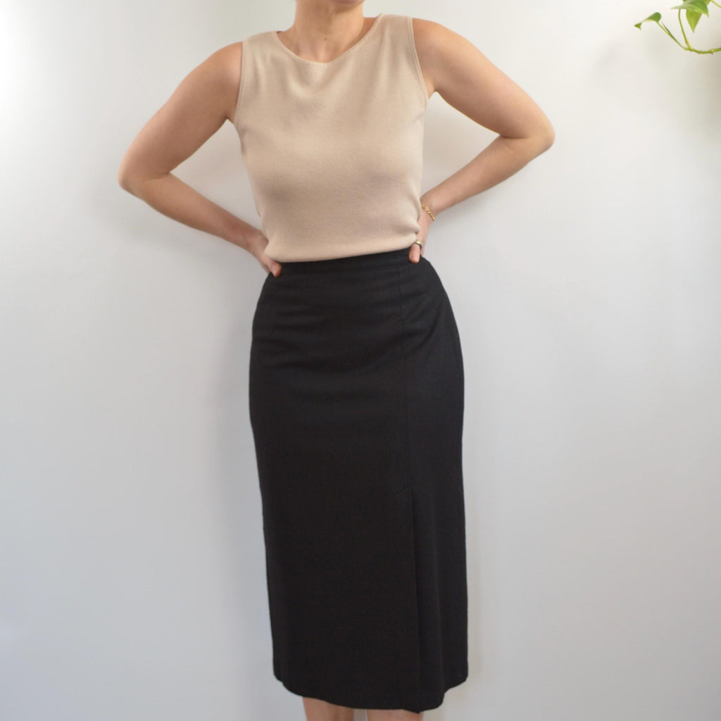 medium black wool midi skirt with off center front slit and full lining