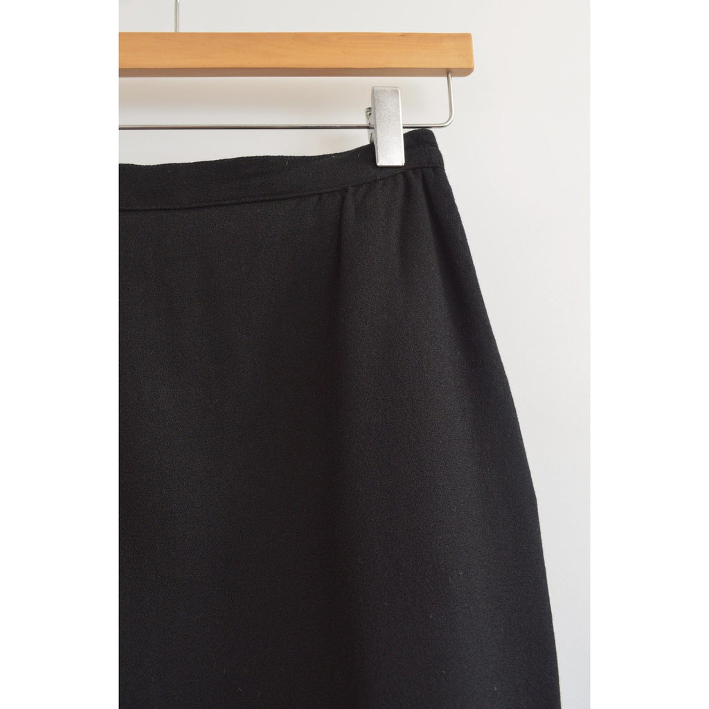fully lined knee length black wool skirt with pockets