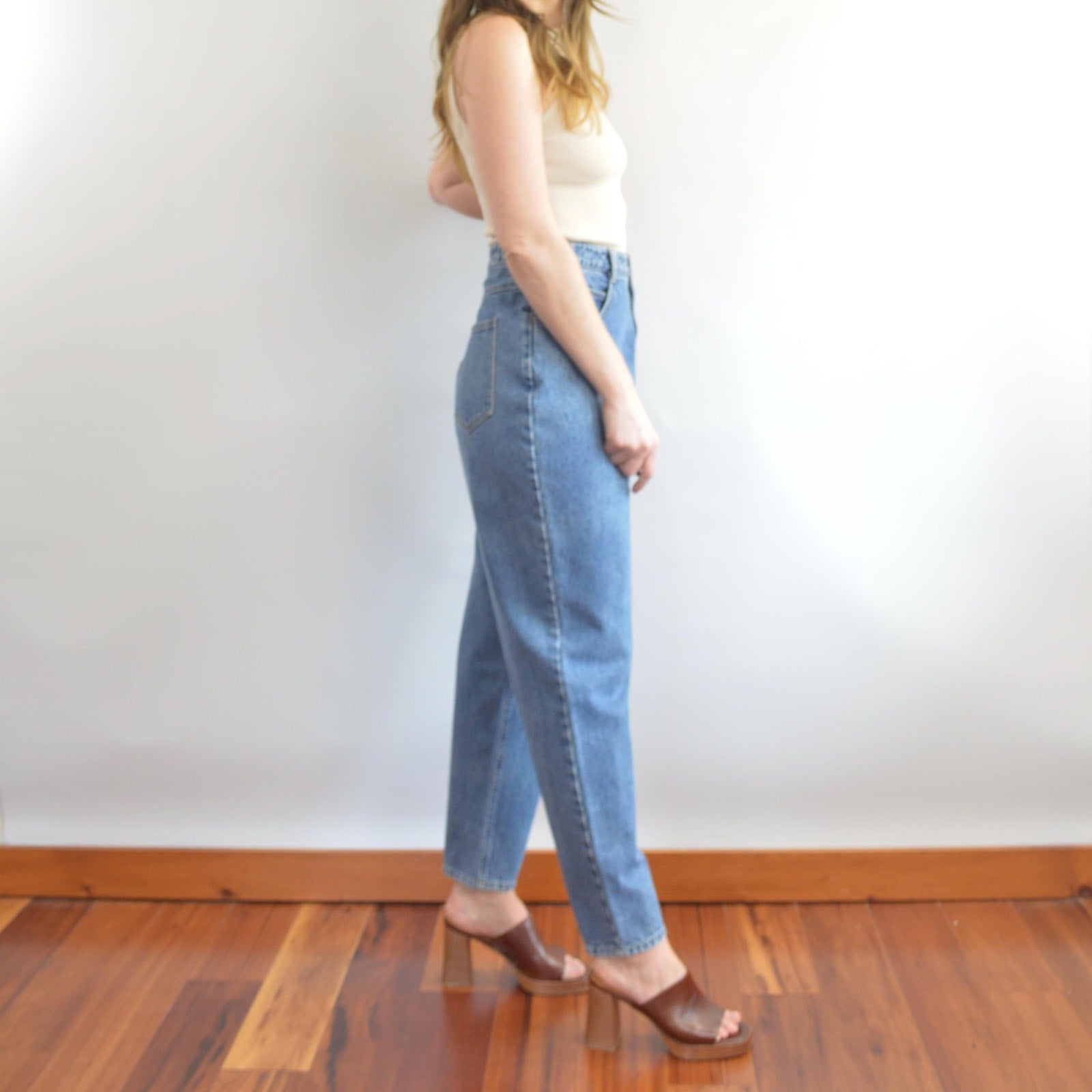 35 x 30 mid wash high rise tapered jeans
