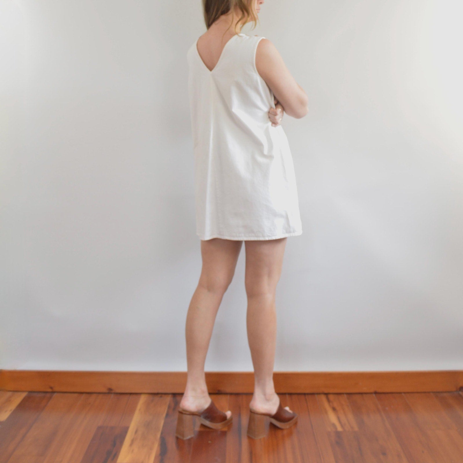 thick structured white denim mini dress