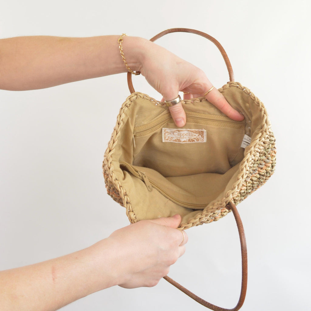 olive, blue and peach striped straw bag with leather handles