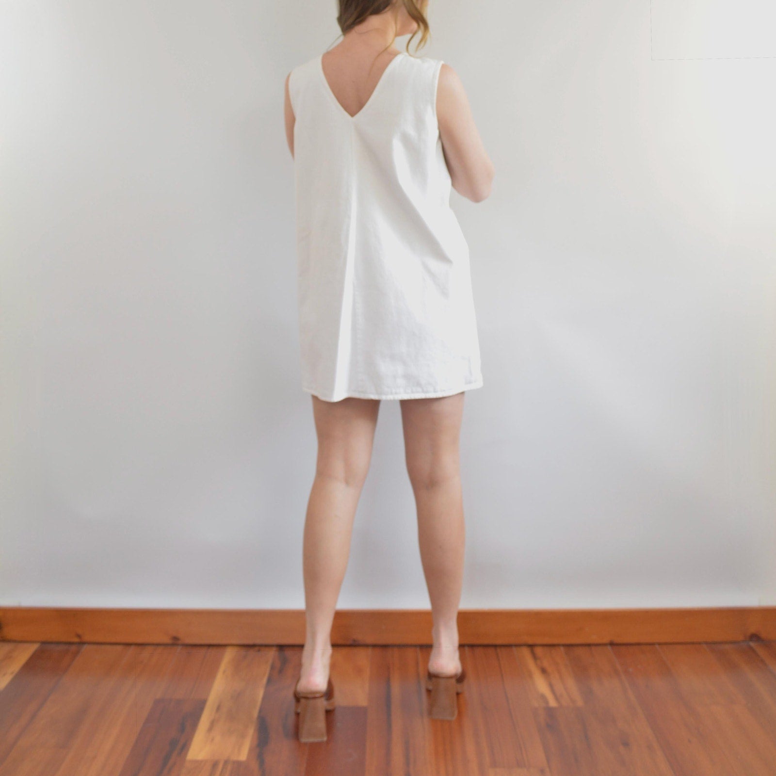 thick structured white denim mini dress